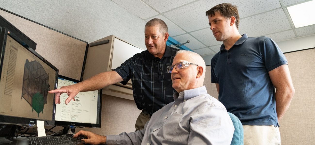 NCT Engineers Reviewing Product Specs on the computer